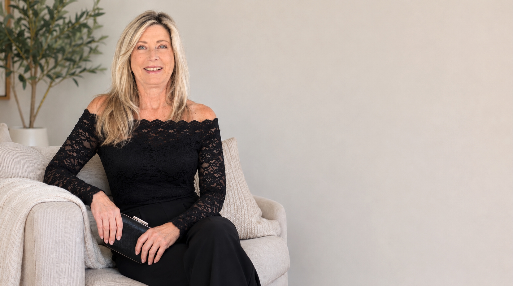 Portrait of Lisa Redman in a warm ivory interior
